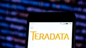 mobile phone screen displaying teradata (TDC) logo, representing cheap stocks to buy