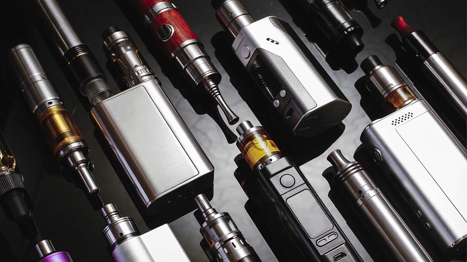 an array of various styles of vaping devices, KAVL brands makes vapes