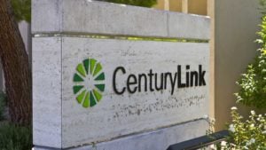 CenturyLink (CTL) sign outside with the green logo on it