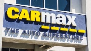 a Carmax (<b><a href='/stocks/KMX'>KMX</a></b>) sign on a storefront