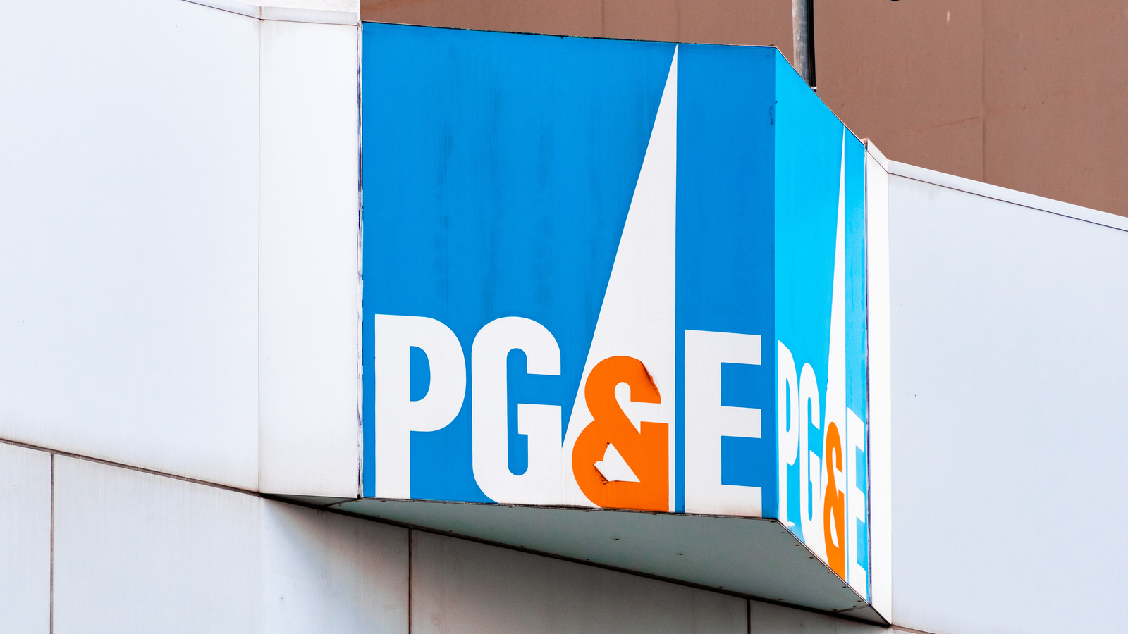 the PG&E logo on the front of a building PCG stock