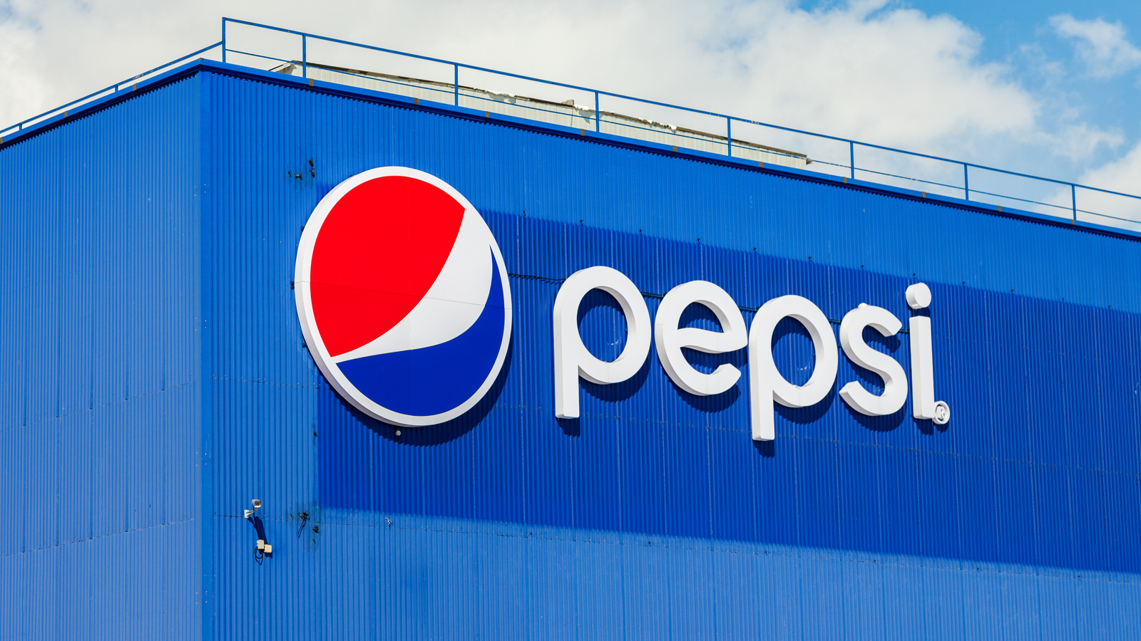 Logotype of PepsiCo (PEP stock) against the blue sky