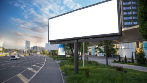 an empty billboard on a highway