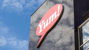 YUM stock: the yum logo on the side of a building