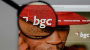 BGCP stock: the BGC Partners logo on a website as viewed through a magnifying glass