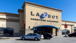 La-Z-Boy (LZB) store with cars in front of it