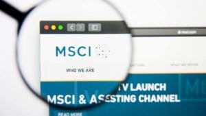 A magnifying glass zooms in on the Msci, Inc. (MSCI) logo