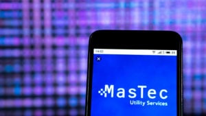 An image of a smart phone displaying the logo for "MasTec Utility Services" with a blue background and lots of purple and pink dots blurred out behind.