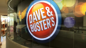 Dave & Buster's (PLAY) logo on a window