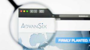 A magnifying glass zooms in on the AdvanSix, Inc. (ASIX) logo on a webpage