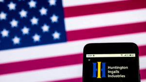 Huntington Ingalls logo displayed on a smartphone screen.