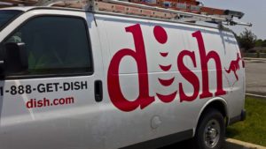 A van for DISH Network (DISH) is parked.