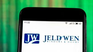 Jeld-Wen (JELD) logo displayed on a smartphone