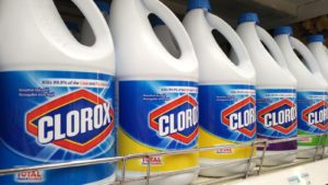 Clorox (CLX) bleach bottles lined up on a store shelf.