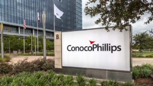 a sign in front of the Conoco Philips office building