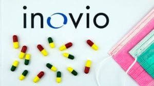 inovio (INO) logo next to pills and face masks