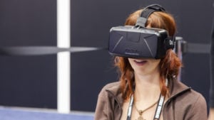 image of a woman wearing a VR headset