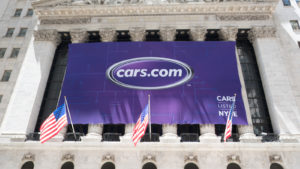 A photo of a cars.com banner