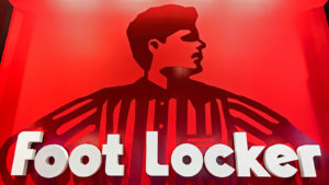 The Foot Locker (FL) logo with a red hue