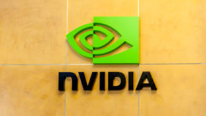Nvidia (NVDA stock) logo on the indoor wall of a corporate building made of yellow tiles
