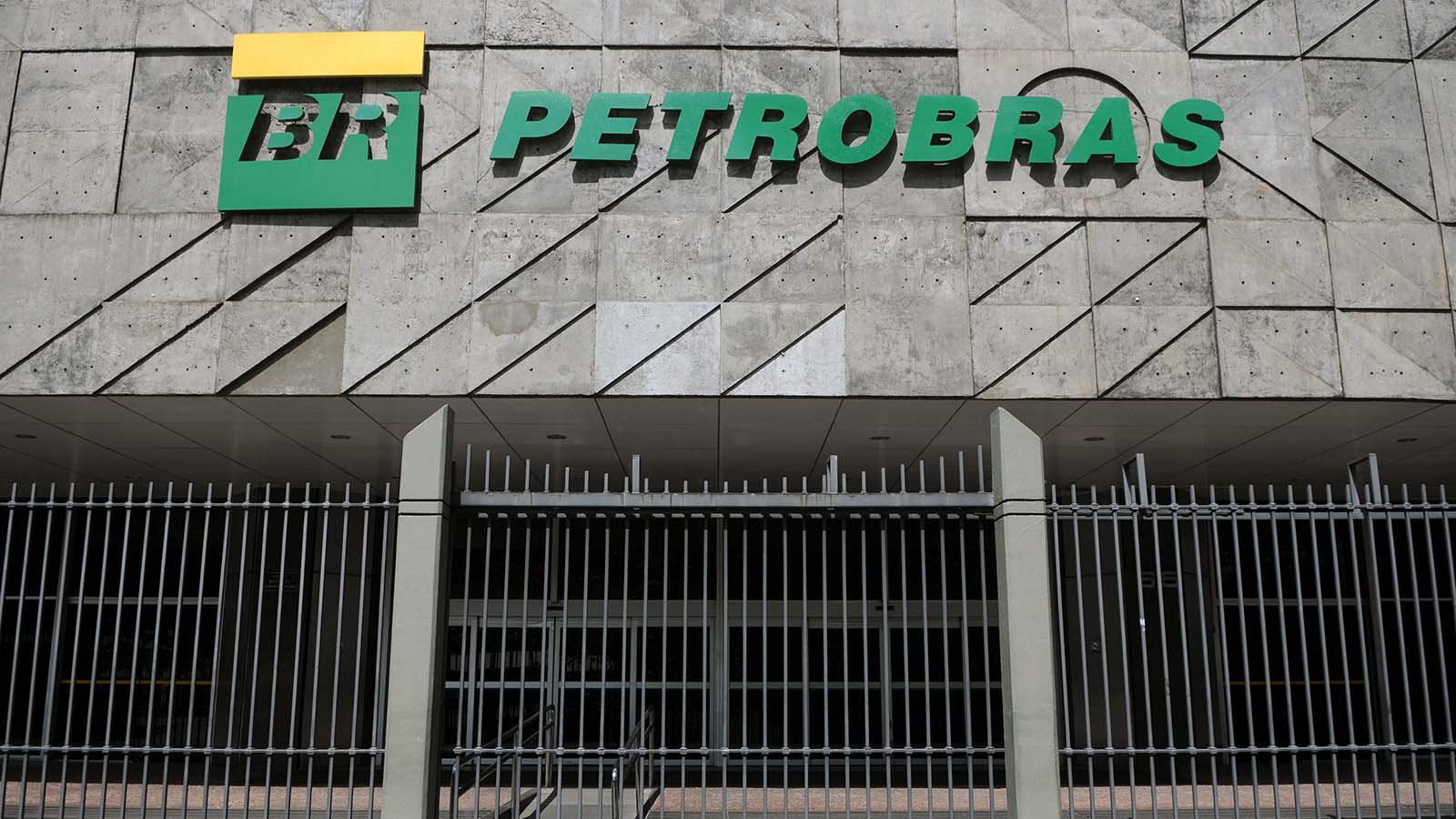 the Petroleo Brasileiro logo on a building during daylight PBR Stock