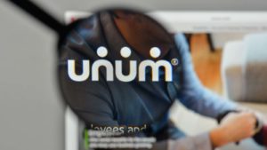 A photo of the Unum logo though a looking glass