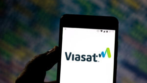 An image of a phone cropped to display the logo for Viasat, Inc. (VSAT)