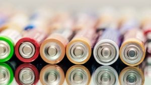 Image of batteries lined up on a table.