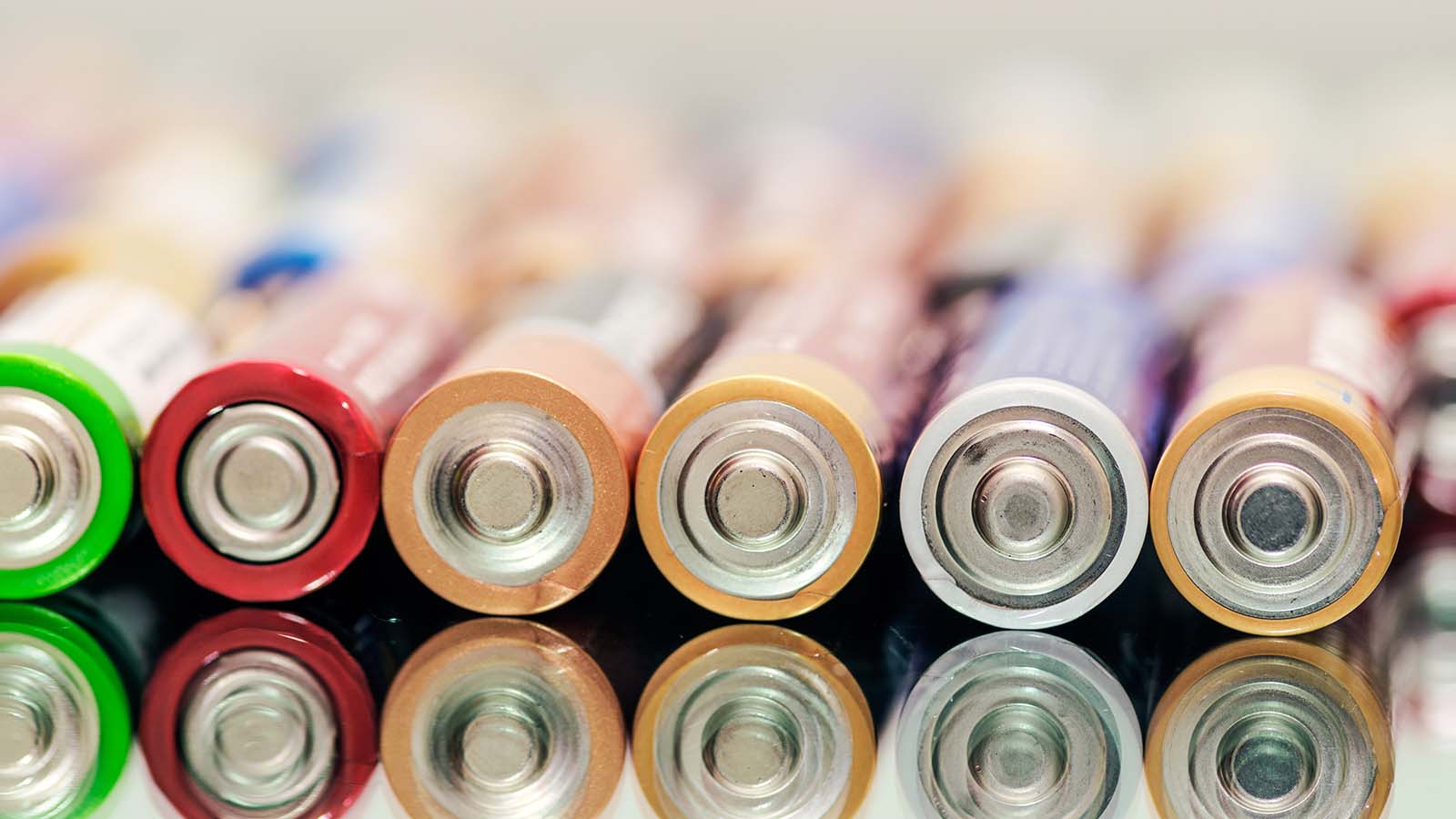 a line of AA batteries to represent battery stocks