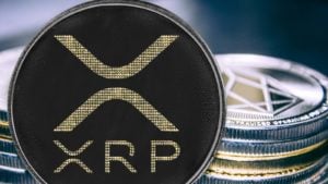 Cryptocurrency coin ripple on the background of a stack of coins