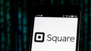 Image of Square (SQ) logo on a mobile phone