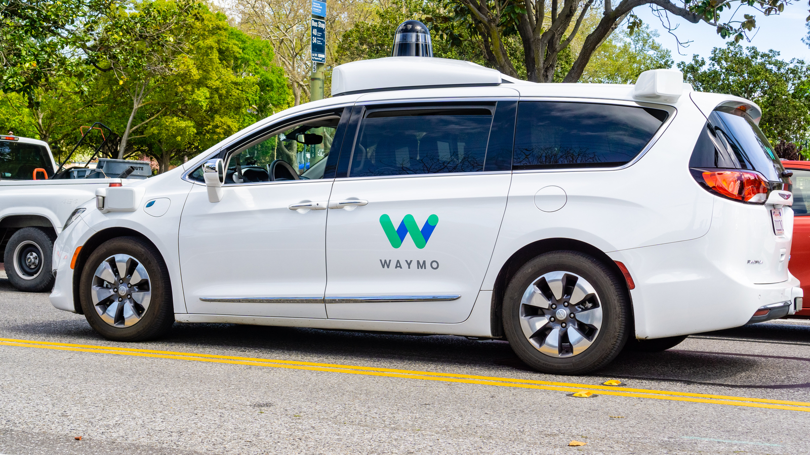Waymo self driving car performing tests on a street near Google's headquarters, Silicon Valley