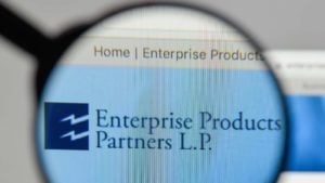 A magnifying glass zooms in on the Enterprise Product Partners (EPD) website