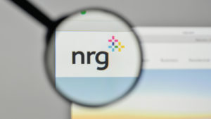Close up of NRG logo on website with blurred background.