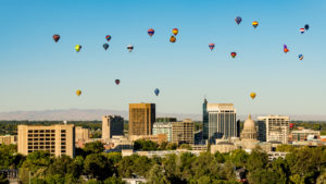 Boise, Idaho skyline with hot air balloons over the city