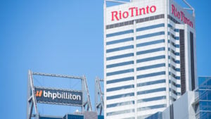 Rio Tinto (RIO) name on a large building against a blue sky