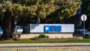 Analog Devices (ADI) sign outside of building. chip stocks to sell