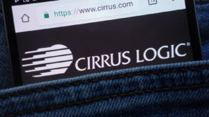 The Cirrus Logic (CRUS) logo on a phone in someone's jeans pocket.