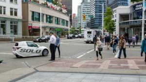 The Solo vehicle from Electra Meccanica Vehicles (SOLO) drives through Vancouver