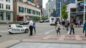 The Solo vehicle from Electrameccanica Vehicles (SOLO) drives through Vancouver.