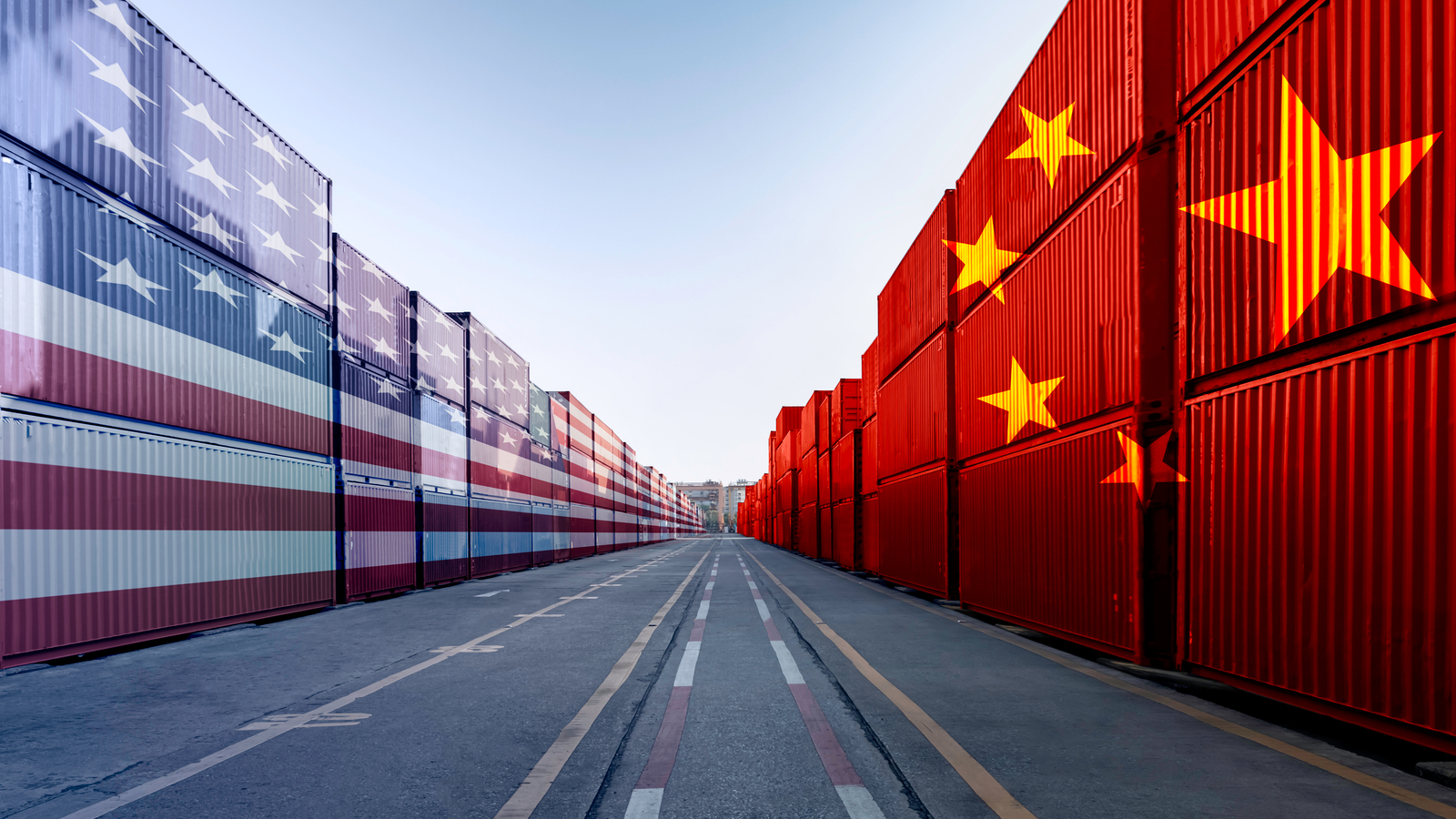 Chinese EV Stocks. Image of U.S. flag and China flag on cargo containers