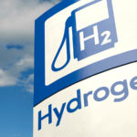 An image of a hydrogen fueling station against a blue sky. top hydrogen stocks to buy