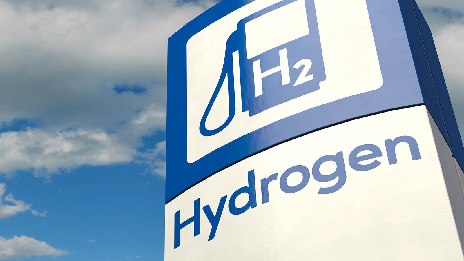 An image of a hydrogen fueling station against a blue sky representing ADN.