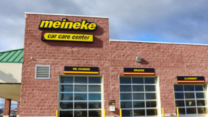 Meineke logo and storefront