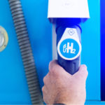 Hydrogen Stocks Man hold a fuel dispenser with hydrogen on gas station. h2 combustion engine for emission free eco friendly transport. Plug Power is one such company working on this power source.