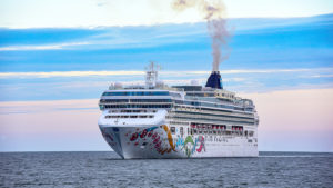 Norwegian Pearl, a Norwegian Cruise Line (NCLH) ship, in the middle of the ocean