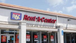 A photo of the Rent a Center logo on storefront in Los Angeles, Cali.