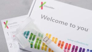 A close-up shot of the saliva collection kit from 23andMe.