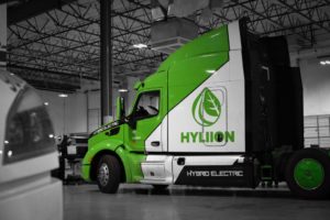 Photo of Hyliion tractor inside service bay representing HYLN stock.