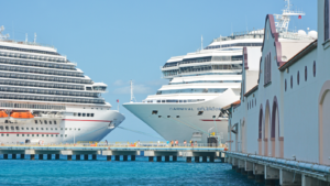 CCL stock cruise stocks docked cruise ships